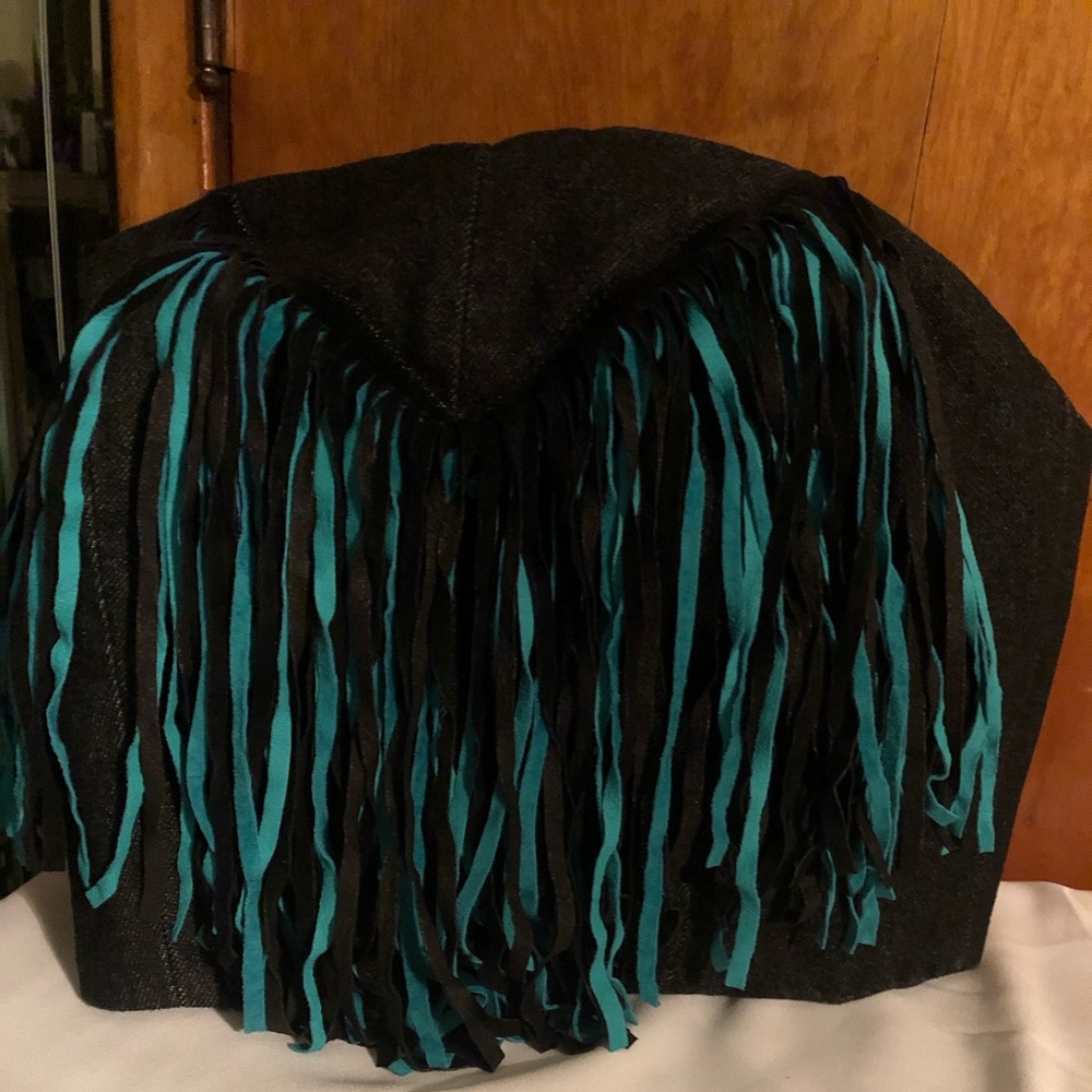 Black denim bustier, black & teal fringes.